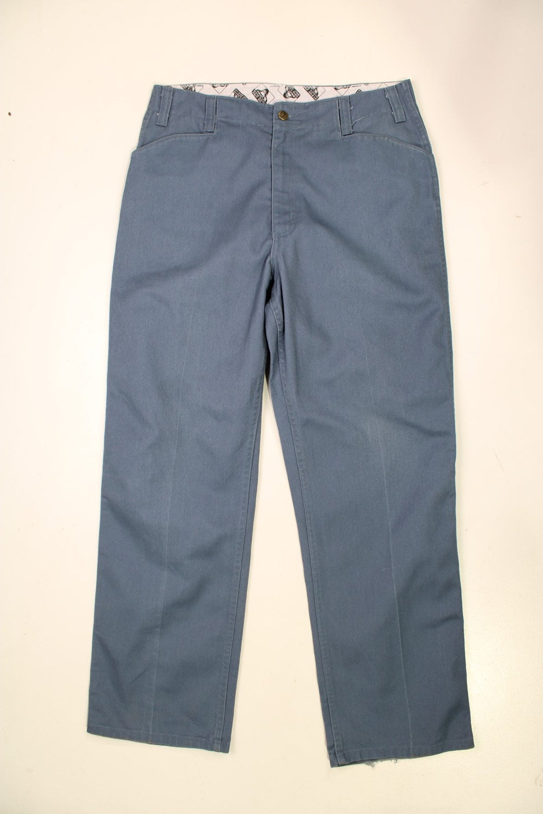 Ben Davis Workwear Trousers in a blue colourway with multiple pockets and the logo embroidered on the back.