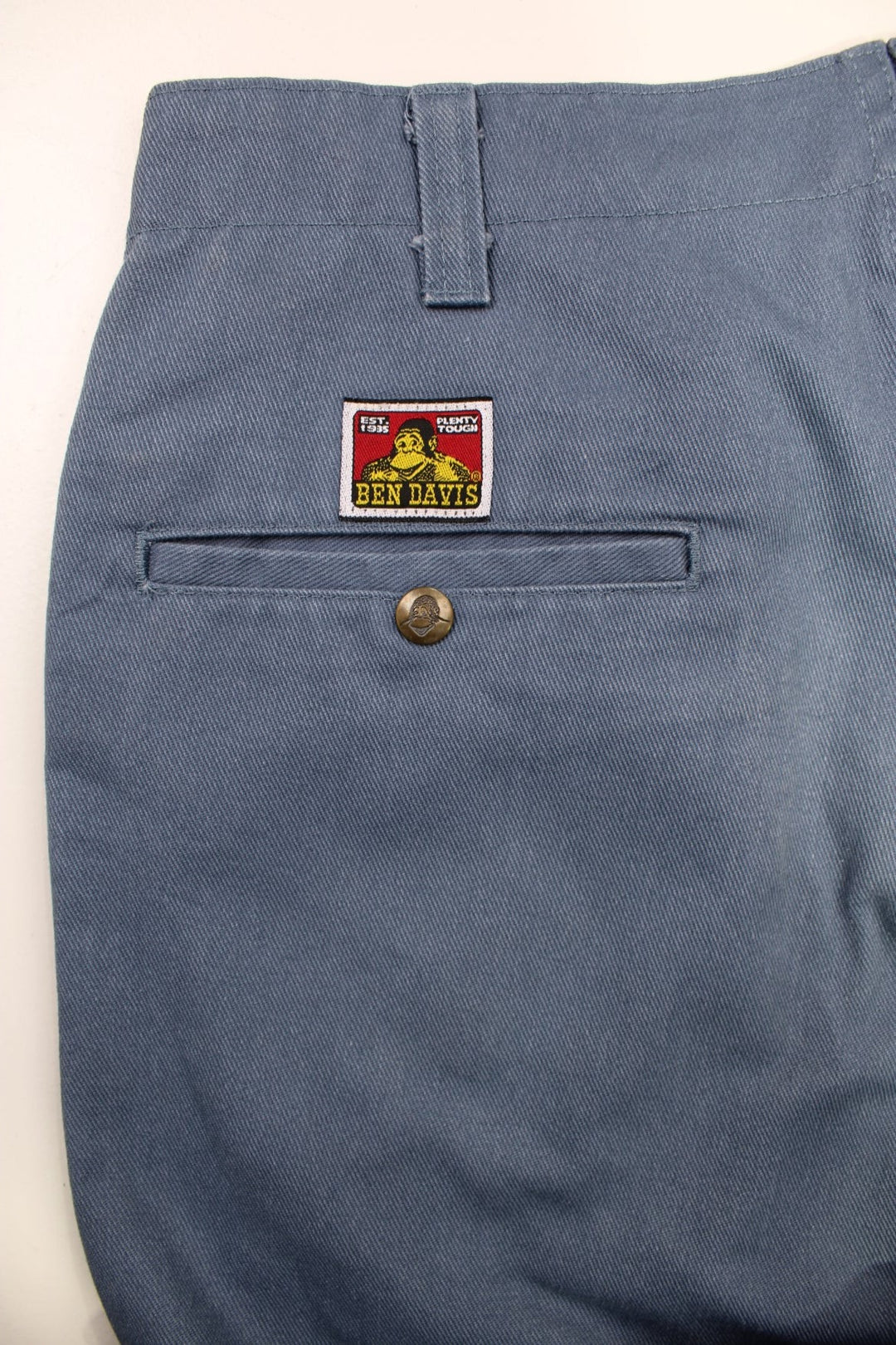 Ben Davis Workwear Trousers in blue colourway with multiple pockets and the logo embroidered on the back.