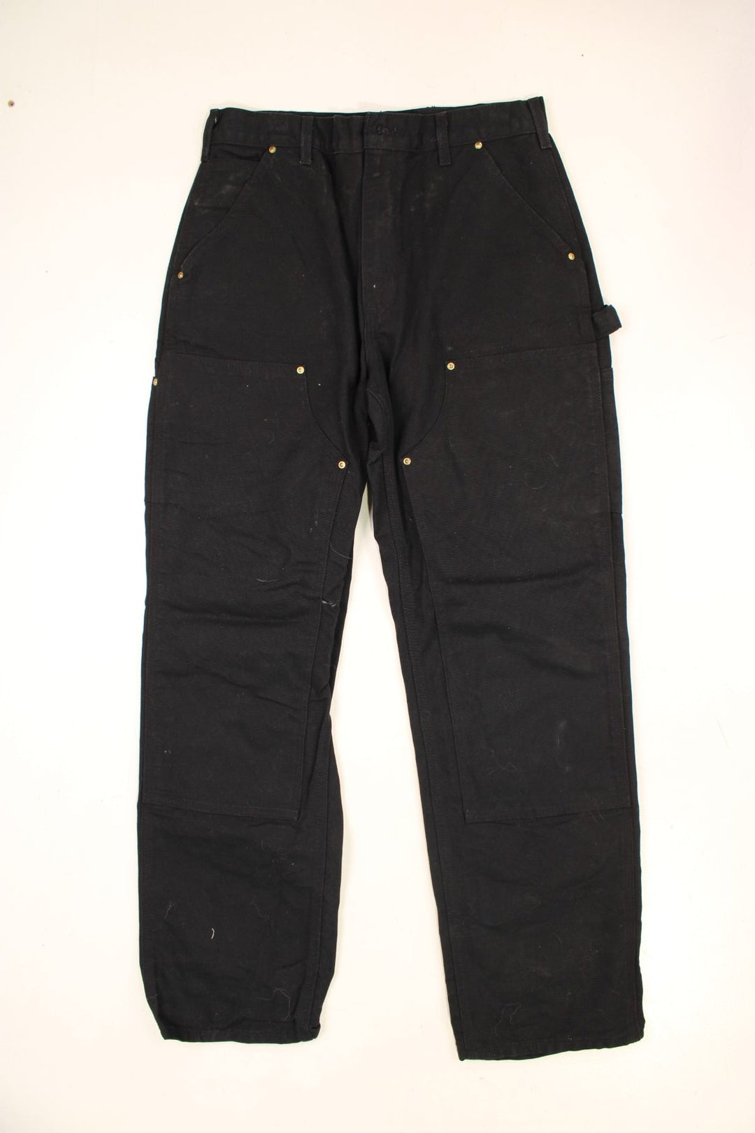 Carhartt Double Knee Jeans in a black colourway with multiple pockets and the logo embroidered on the back.