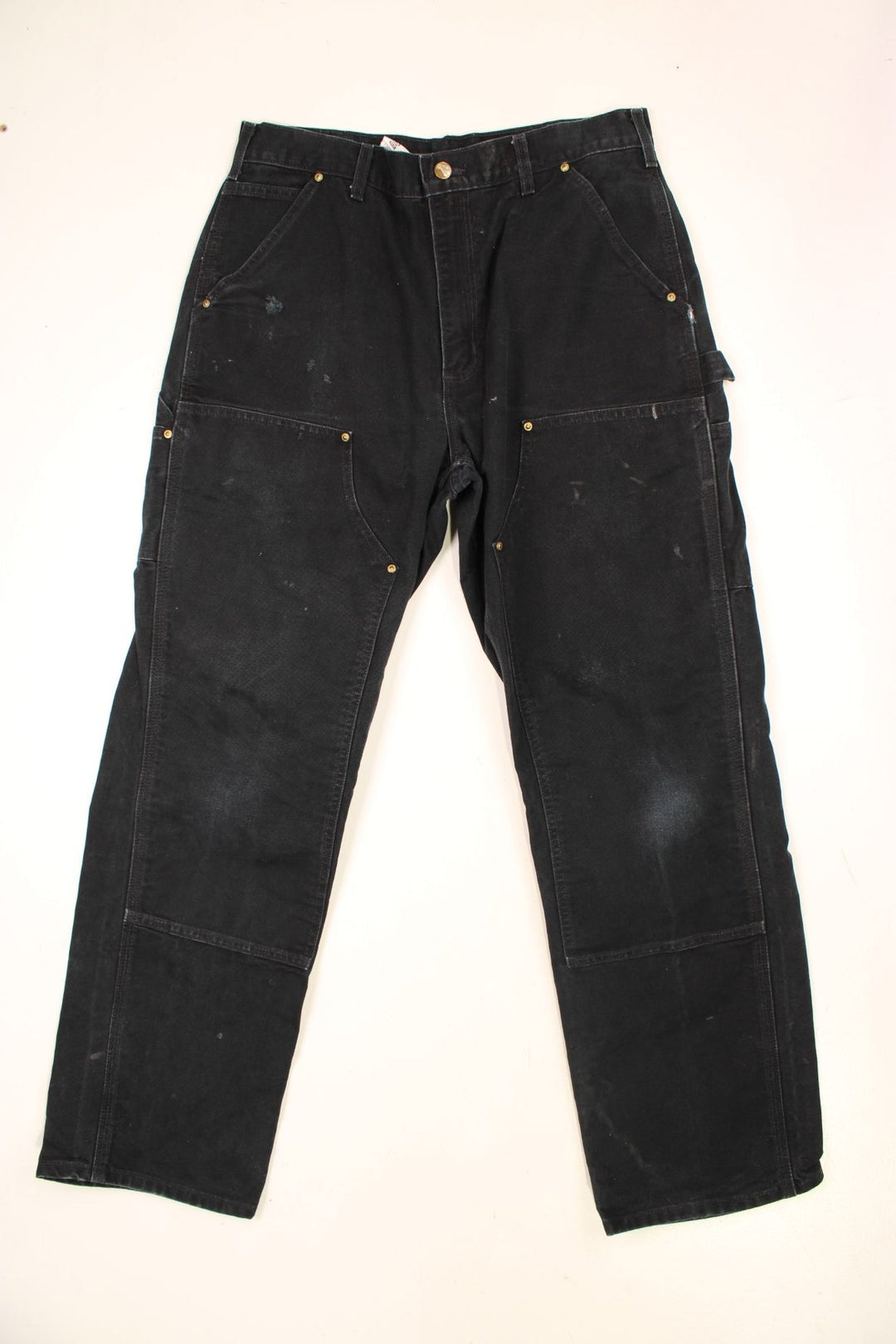 Carhartt Double Knee Jeans in a black colourway with multiple pockets and the logo embroidered on the back.