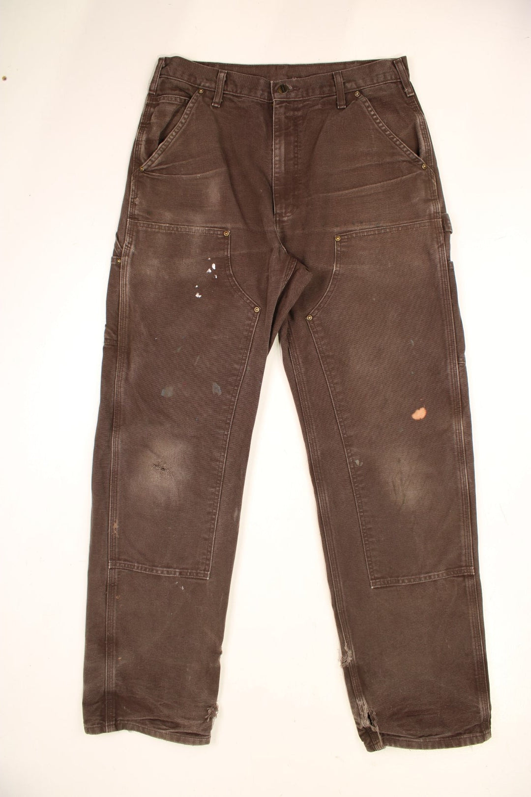 Carhartt Double Knee Jeans in a brown colourway with multiple pockets and the logo embroidered on the back.