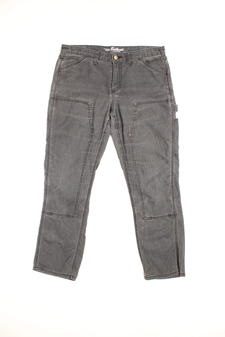 Carhartt Double Knee Jeans in a faded grey colourway, slim straight leg, multiple pockets and has the logo embroidered on the back. 