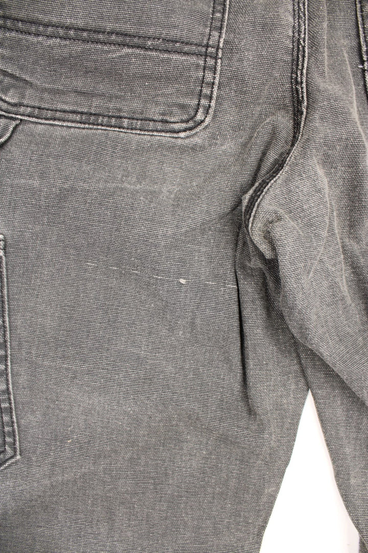 Carhartt Double Knee Jeans in a faded grey colourway, slim straight leg, multiple pockets and has the logo embroidered on the back. 