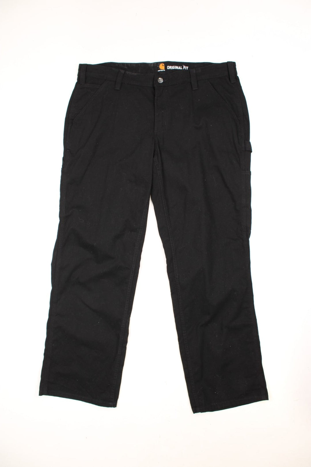 Carhartt black carpenter jeans with front, back and side pockets, a hammer loop, and a logo patch on the back pocket. 