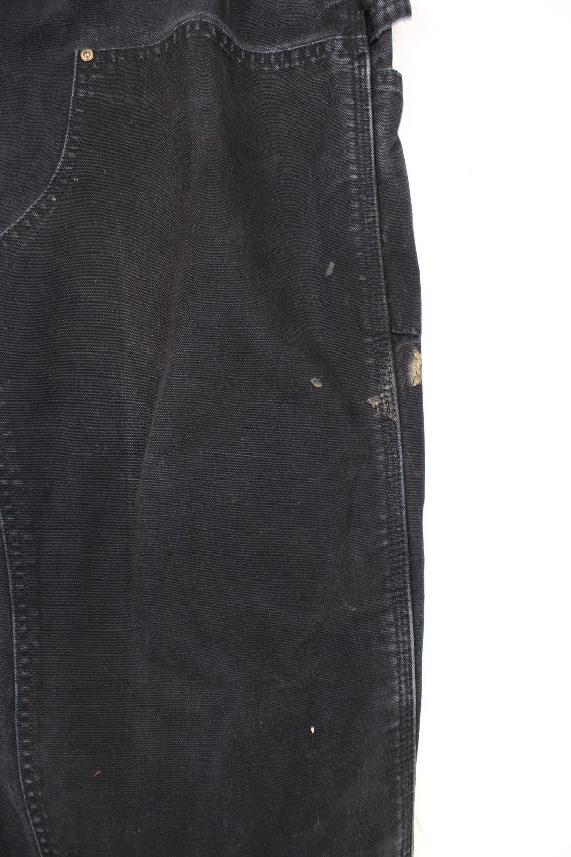 Carhartt double knee jeans with front, back and side pockets, a hammer loop, and a logo patch on the back pocket. 