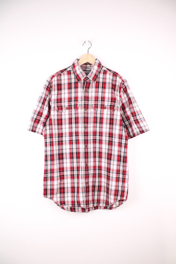 Carhartt red, white and black plaid button through shirt. Features chest pockets and embroidered logo. 