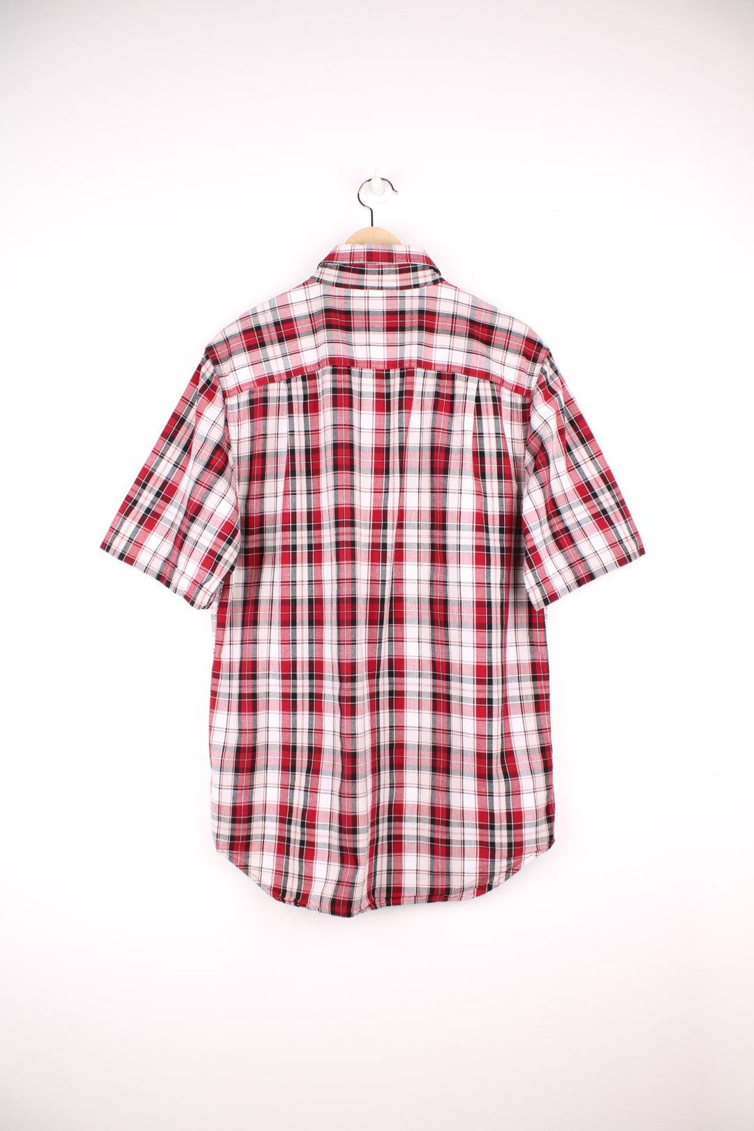 Carhartt red, white and black plaid button through shirt. Features chest pockets and embroidered logo. 