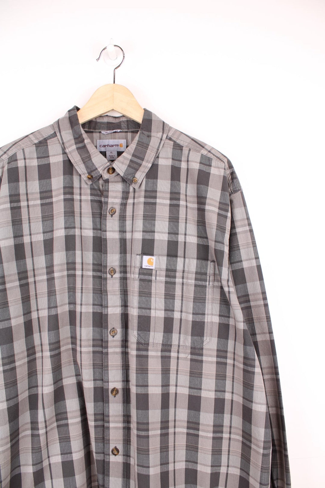 Carhartt grey and black checked shirt with chest pocket and embroidered logo.