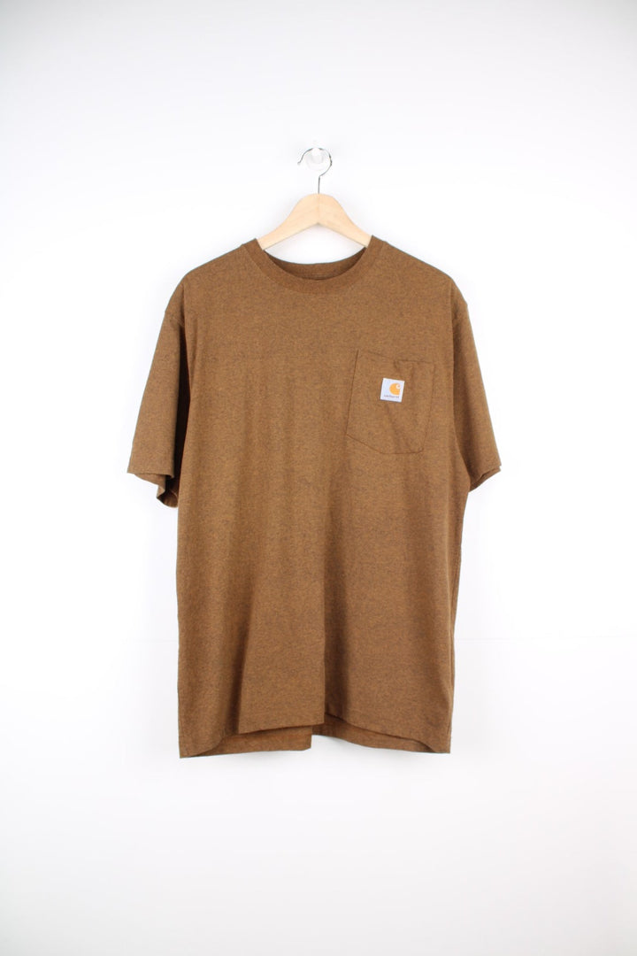 Carhartt T-Shirt in a brown colourway, has a chest pocket with the logo embroidered on it. 