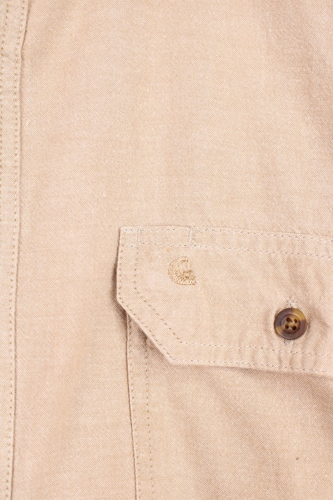 Carhartt Short Sleeve Shirt in a tanned colourway, button up, has double chest pockets and the logo embroidered on the front. 