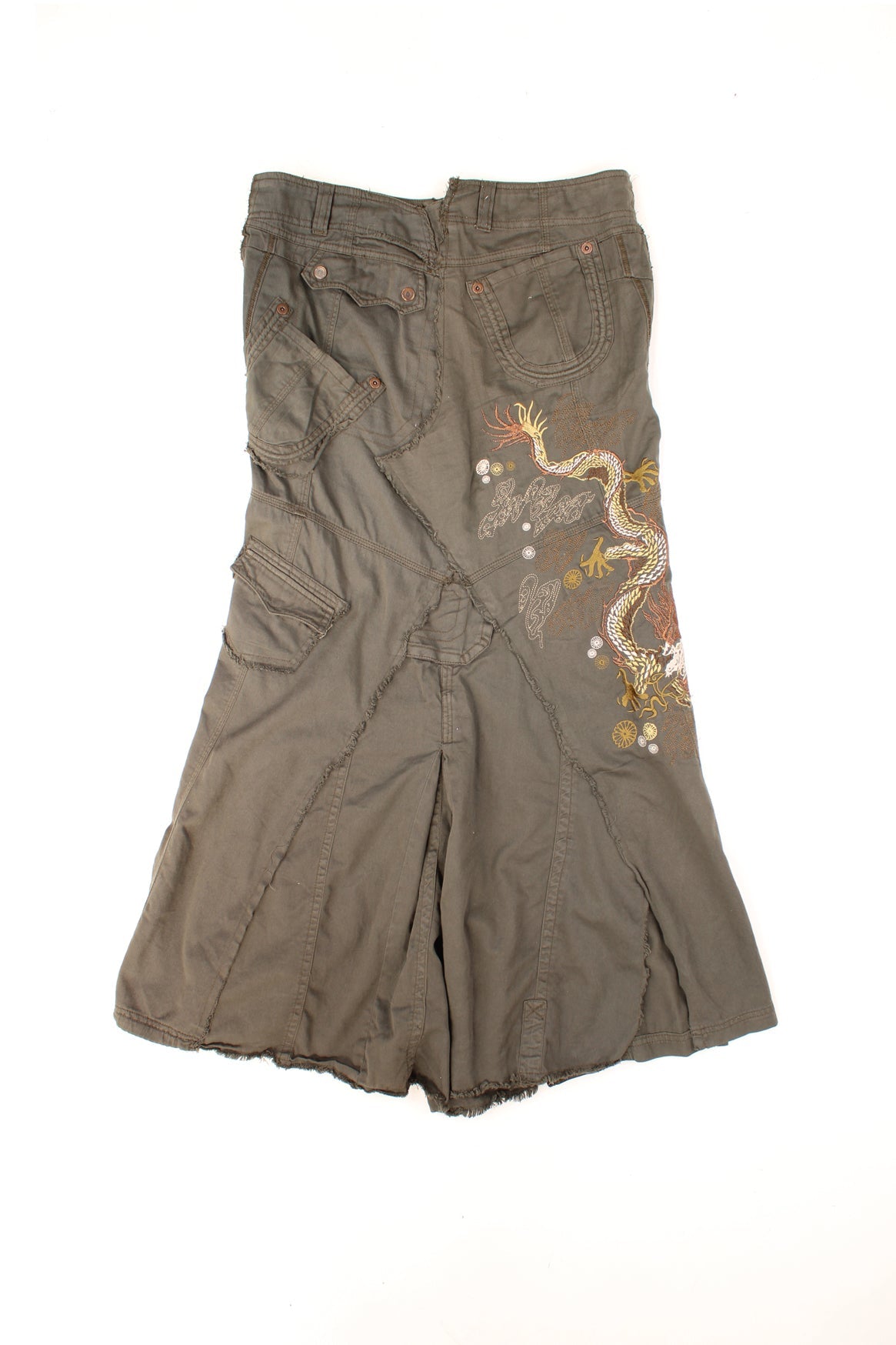 Y2K distressed embroidered maxi skirt by River Island with asymettrically placed pockets, pleats and a central slit in the front, with embellished button closure. 