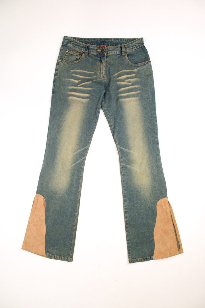 Y2K low rise slit flared jeans in a green-blue stonewash with three pockets and tan faux suede patches on the hem - by Too Hot.