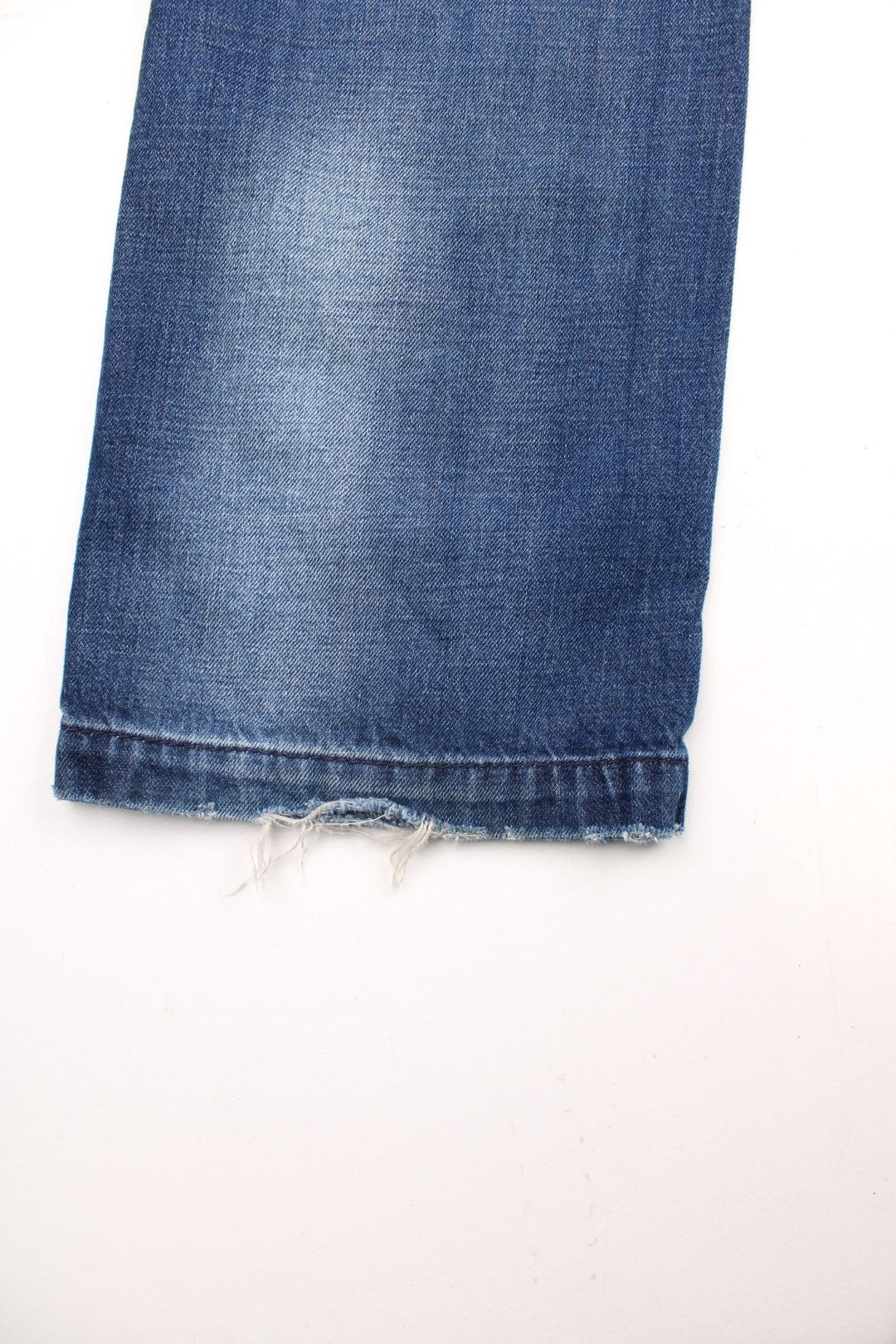 Miss Sixty 'Barbuda' straight leg jeans in a faded blue wash with four pockets, a branded tab on the reverse, and large circular snaps on the front pockets. 