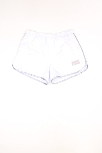 Vintage Reebok dance shorts with elasticated drawstring waist. Features embroidered logo and silver detailing. 
