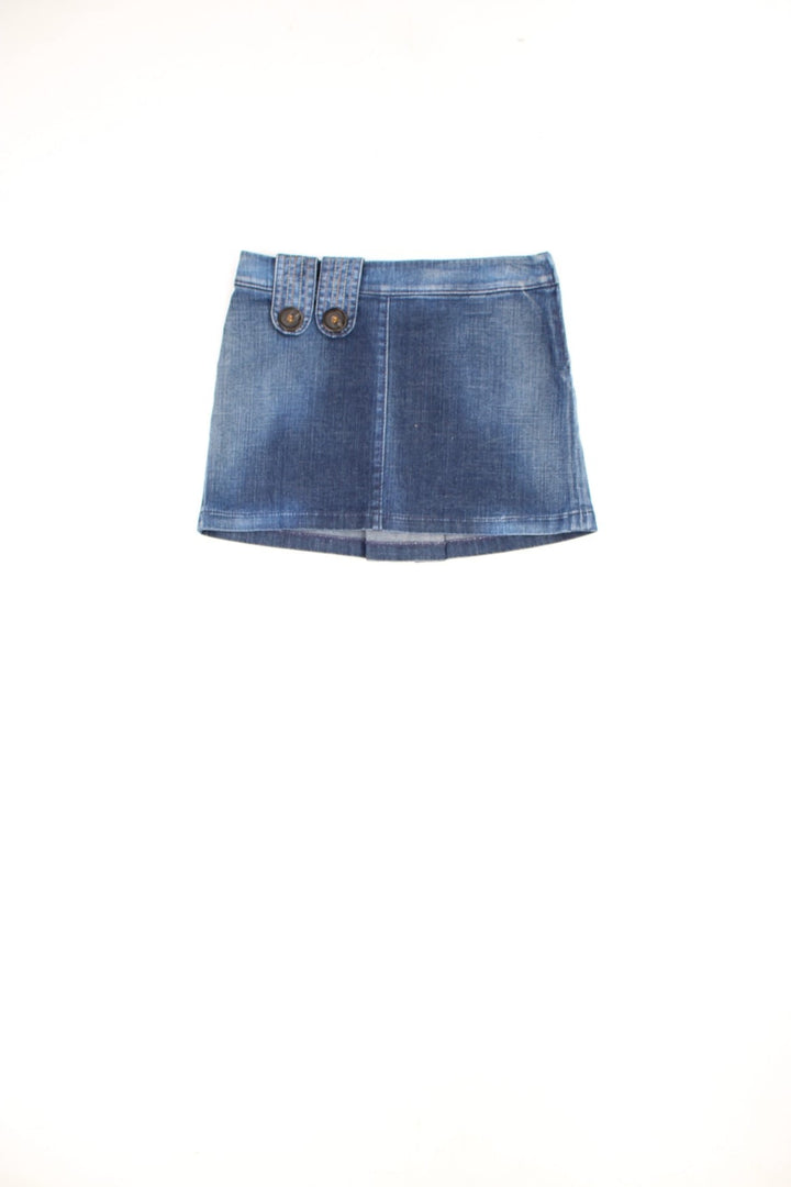 Miss Sixty low rise denim mini skirt with side zip, pleat on the back, embroidered logo and button feature. 