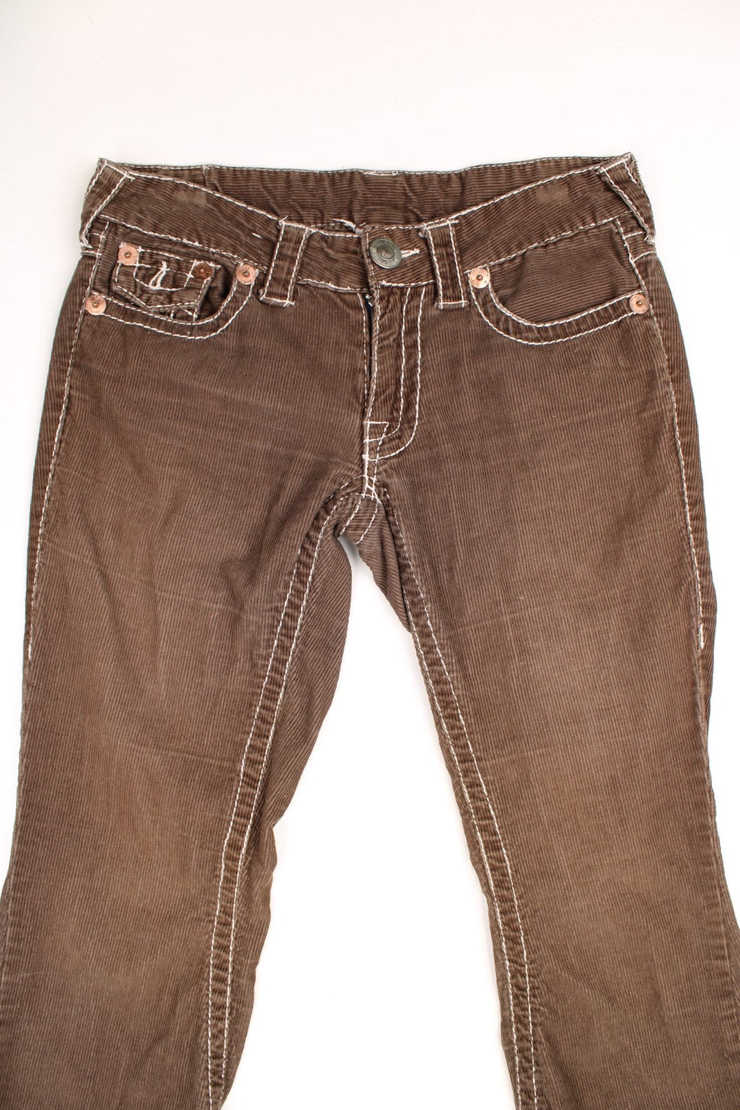 Y2K True Religion Corduroy Trousers in a brown colourway with cross stitiching throughout, multiple pockets, and the logo embroidered on the back. 