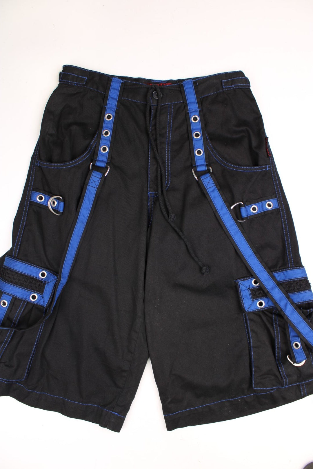 Tripp NYC Rave Shorts in a black and blue colourway with multiple pockets, and has straps going all around the shorts.