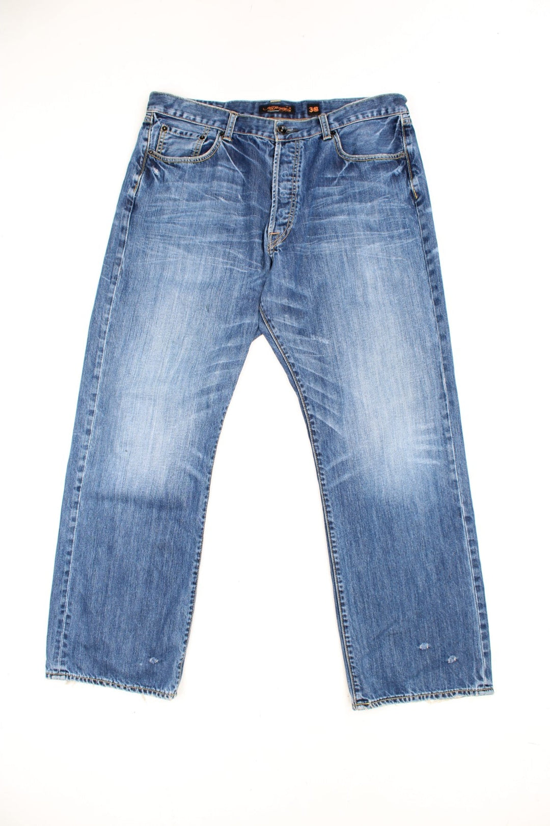 Vintage Y2K Ed Hardy faded effect blue denim Jeans with embroidered spell out logo on the back pocket.  