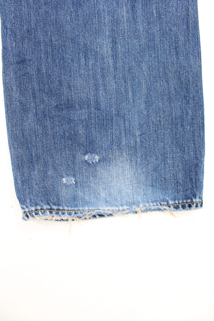 Vintage Y2K Ed Hardy faded effect blue denim Jeans with embroidered spell out logo on the back pocket.  