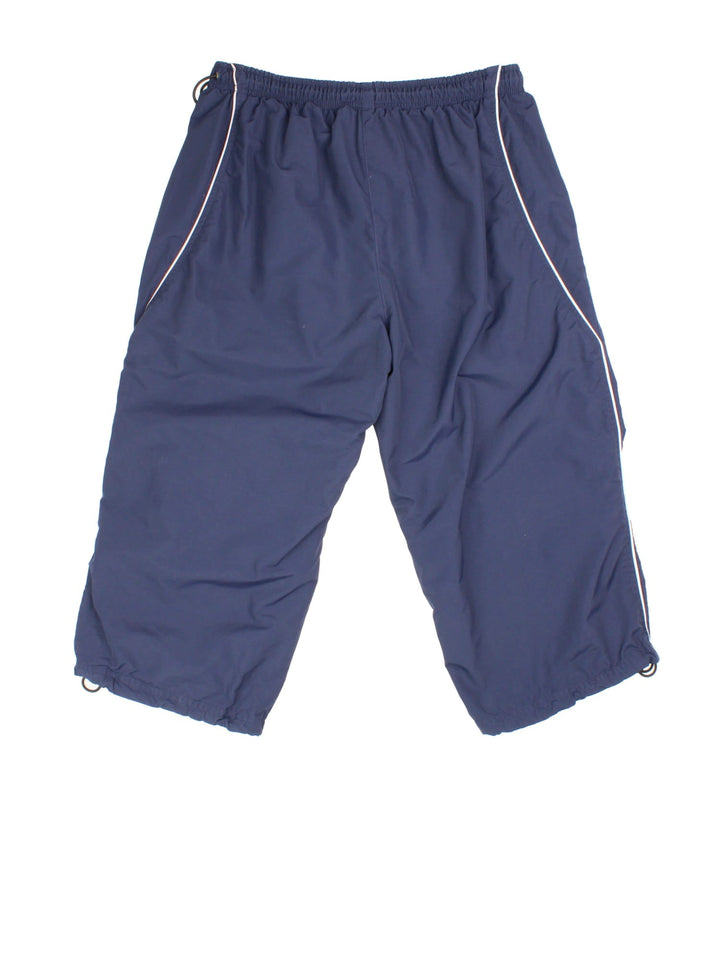 Y2K 3/4 Length Nike shorts in blue colourway. Elasticated waist and draw string hem