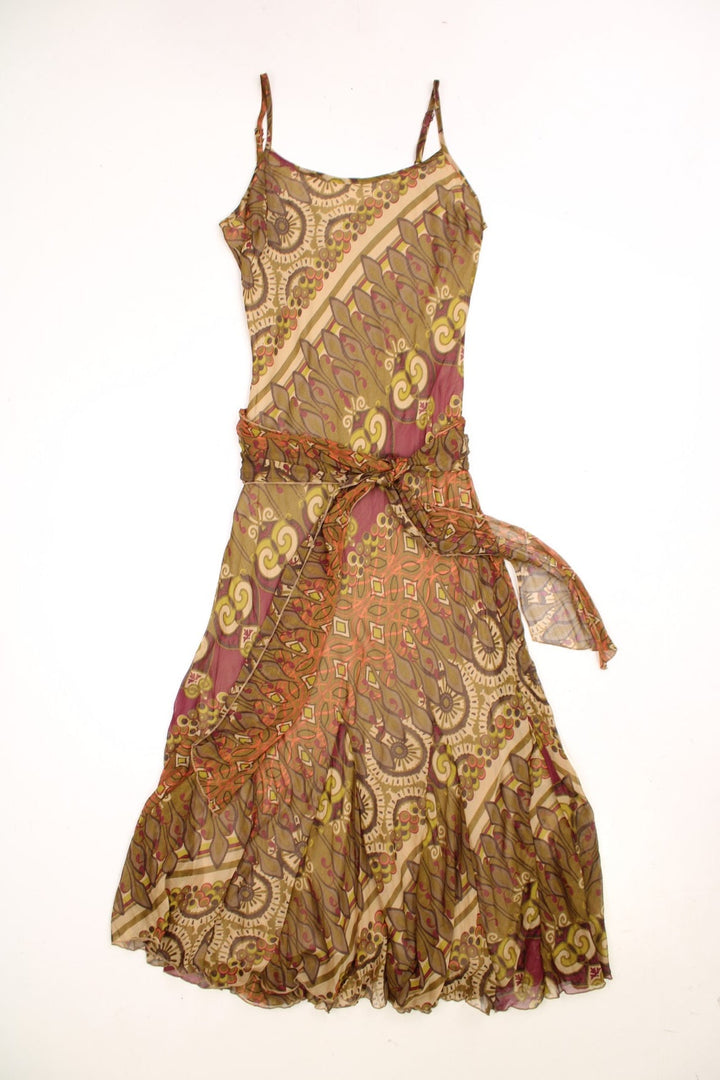 Next green patterned maxi dress with adjustable straps, a matching waist sash/belt, and a flouncy pleated A-line skirt.  