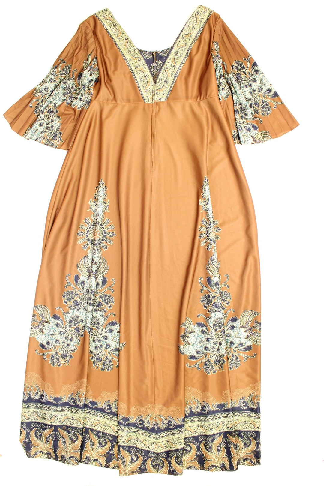 Vintage 70s Chateau D'este floral maxi dress in a brown colourway with pleated sleeves, a blue and green batik print, square neckline and zip closure.