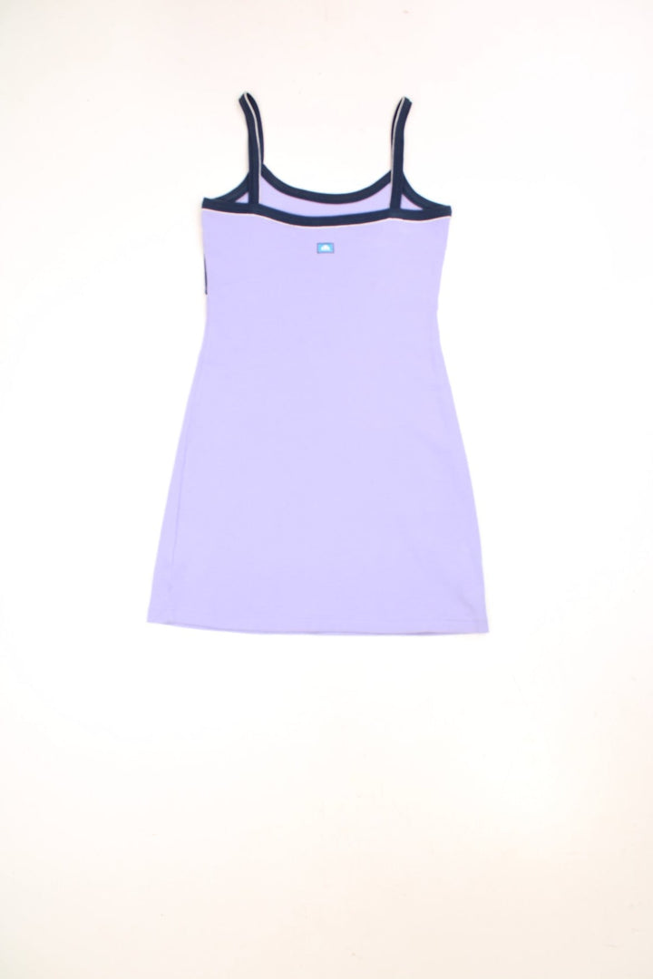 Y2K Ellesse sporty mini dress in lilac with navy blue accents, white piping and an embroidered logo on the chest. 