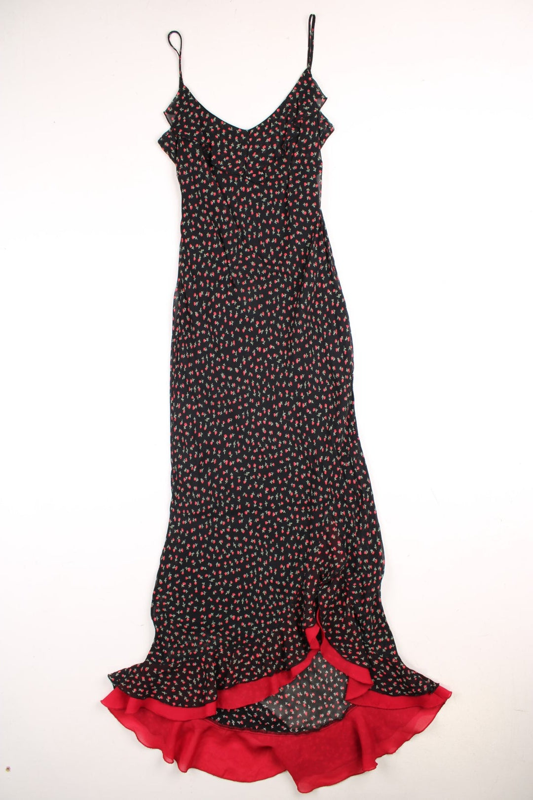 Y2K Bay strappy maxi dress in black with a red ditsy floral print and ruffles at the bust and hem.