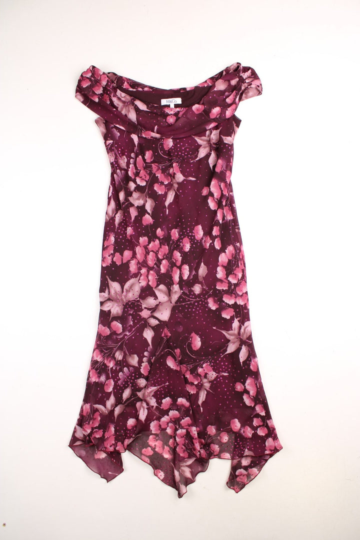 Y2K M&CO midi dress in purple with a pink floral design, pink glitter embellishments, a cowl neck and back, and a floaty hem.