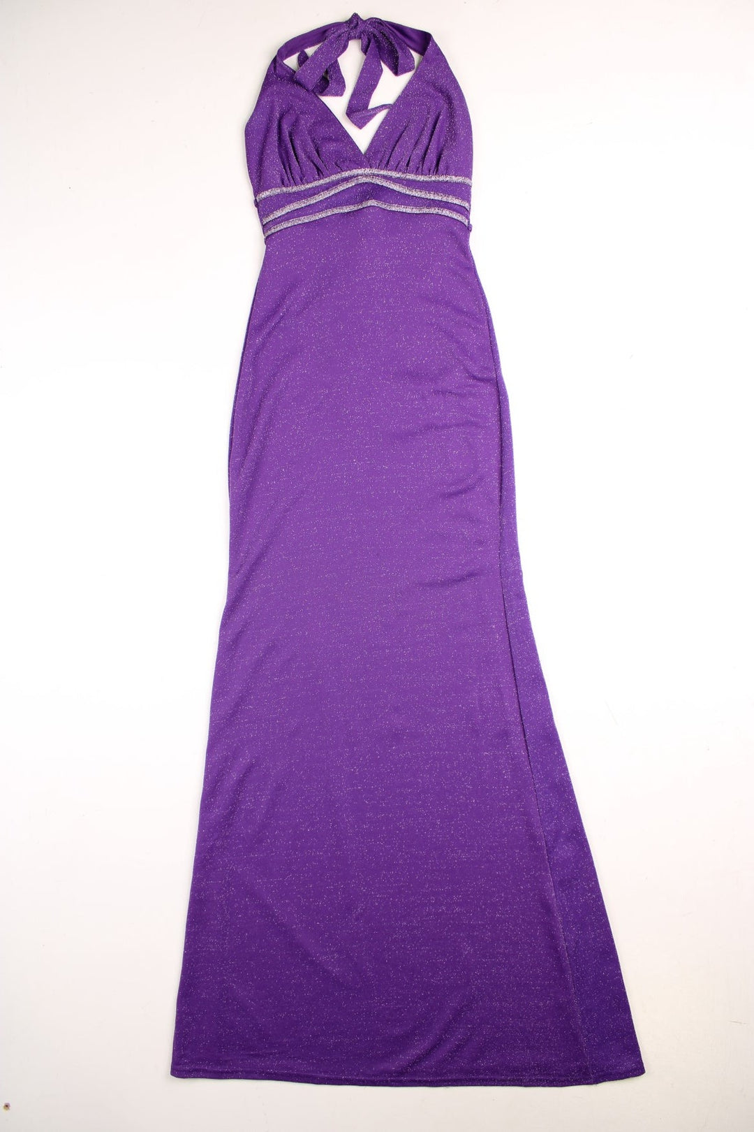 Y2K Jane Norman dress in a glittery purple stretch fabric, with a halter neck, two ties at the back, and sparkly silver detailing under the bust.