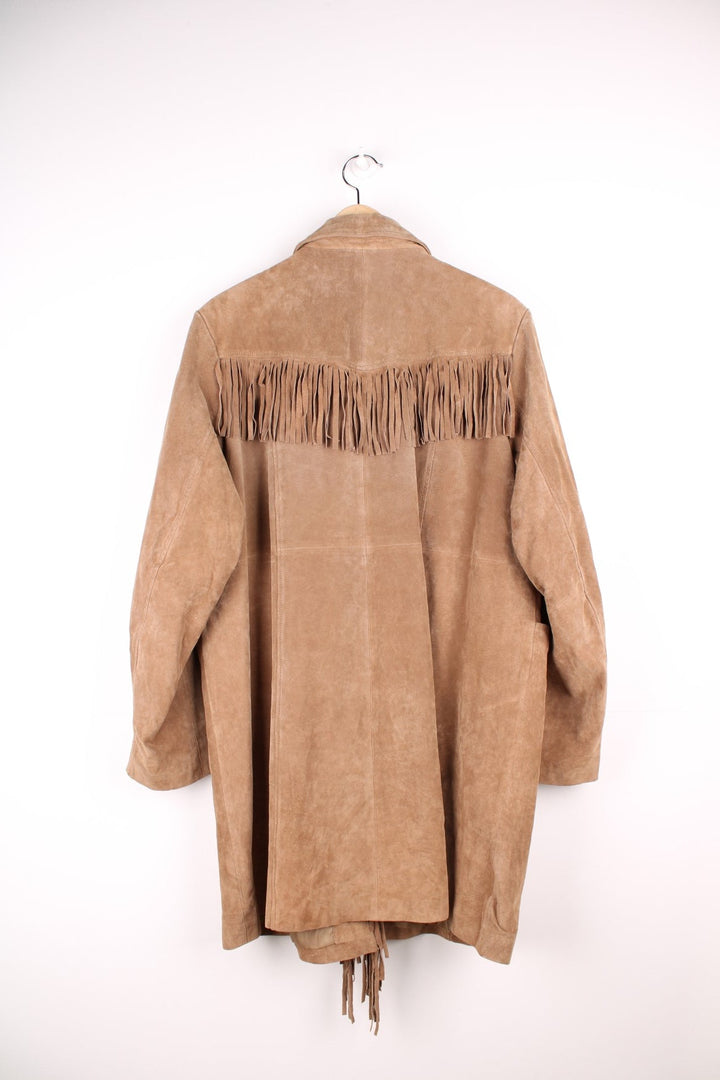 Y2K real suede jacket in tan by Centigrade with hook and eye closure, two pockets, and fringe on the front and back. 