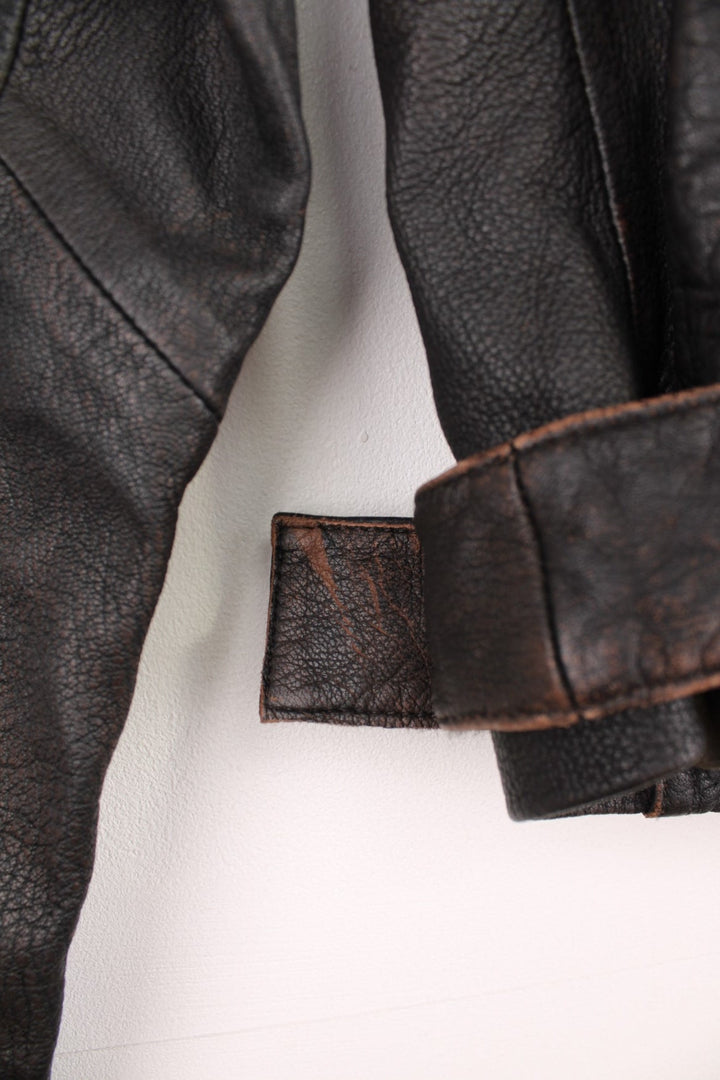 Y2K dark brown leather biker style jacket, zip-through with two side pockets. 