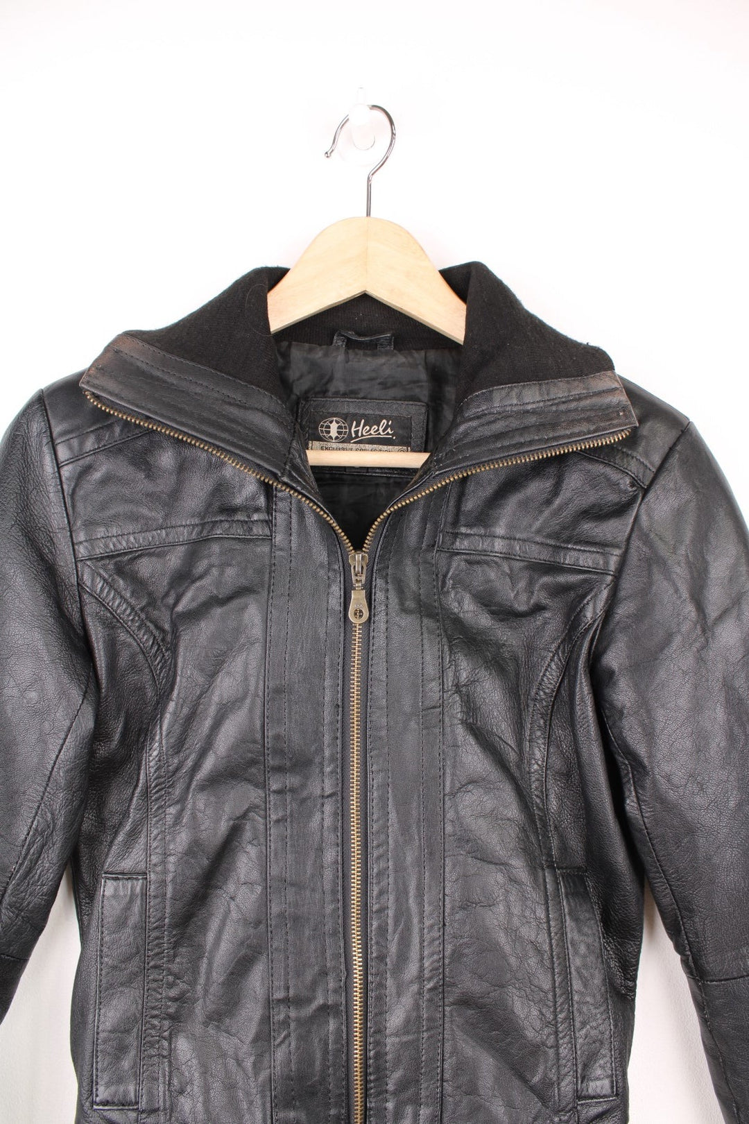 Y2K zip-through leather jacket with two side pockets. 