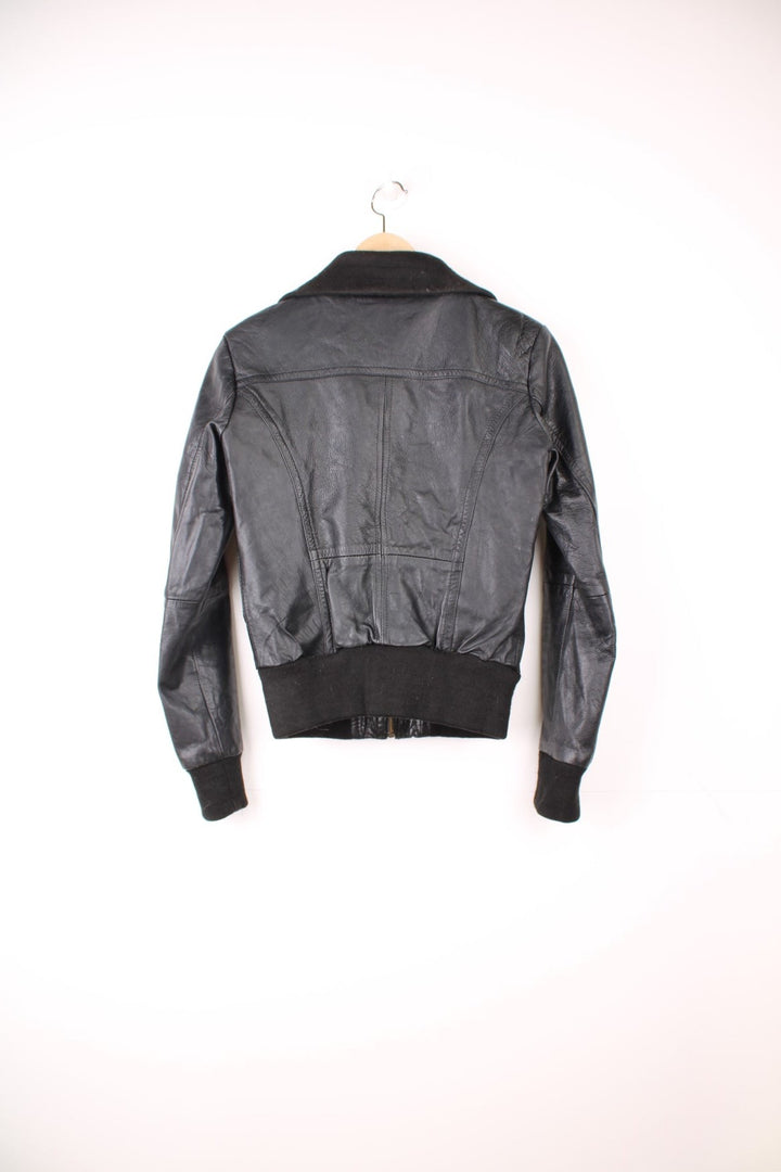 Y2K zip-through leather jacket with two side pockets. 