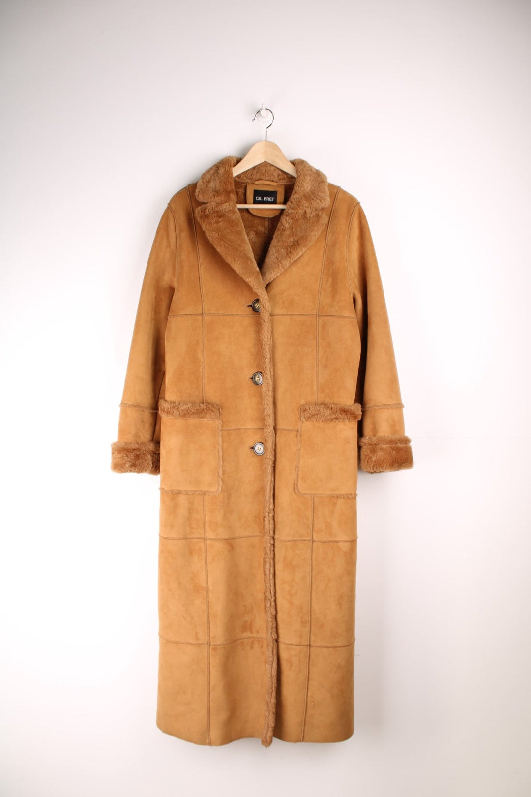 Gil Bret faux suede and fur maxi length afghan style coat with two patch pockets and button closure. 