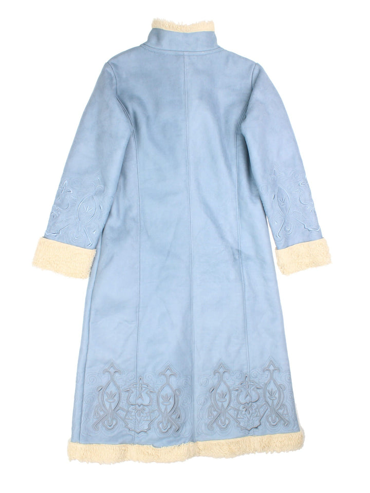 Y2K suede-effect afghan coat in powder blue with sherpa trim, embroidery around the hem and sleeves, two pockets, and button closure, by Centigrade.