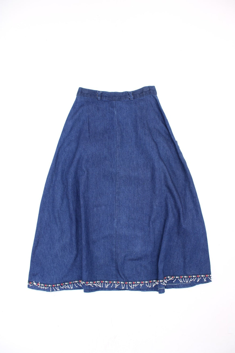 Vintage Denim Skirt in blue colourway with floral bead patterns embroidered on the hem, high waisted and has side pockets.