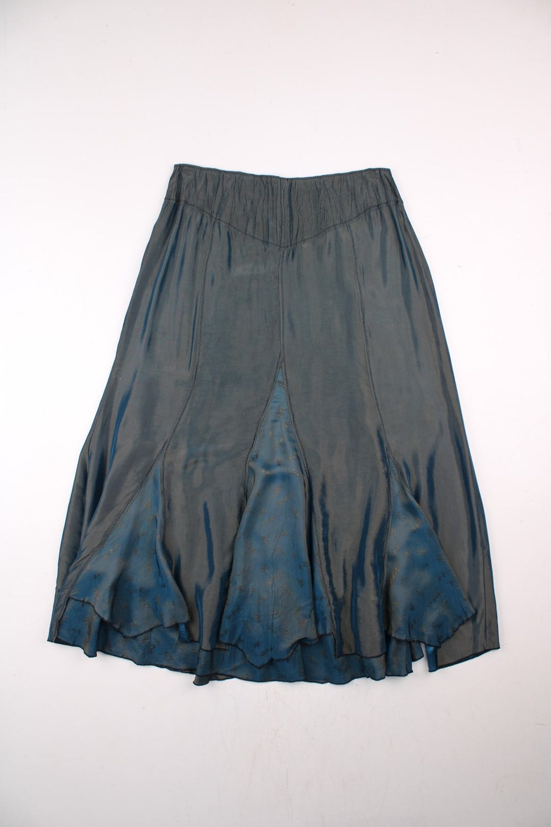 Vintage Y2K Metallic skirt in blue colourway with floral patterns embroidered at the bottom.