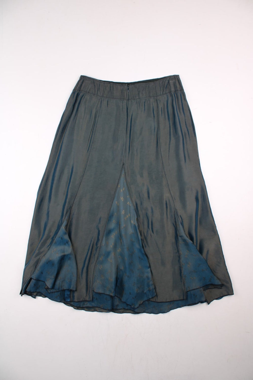 Vintage Y2K Metallic skirt in blue colourway with floral patterns embroidered at the bottom.