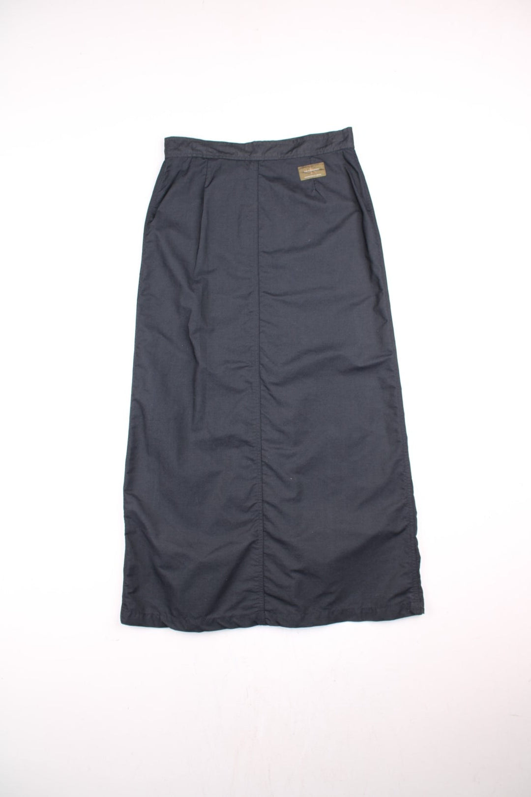 Y2K Calvin Klein Midi Skirt in black colourway, button up with pockets on the front and has the logo embroidered on the back.