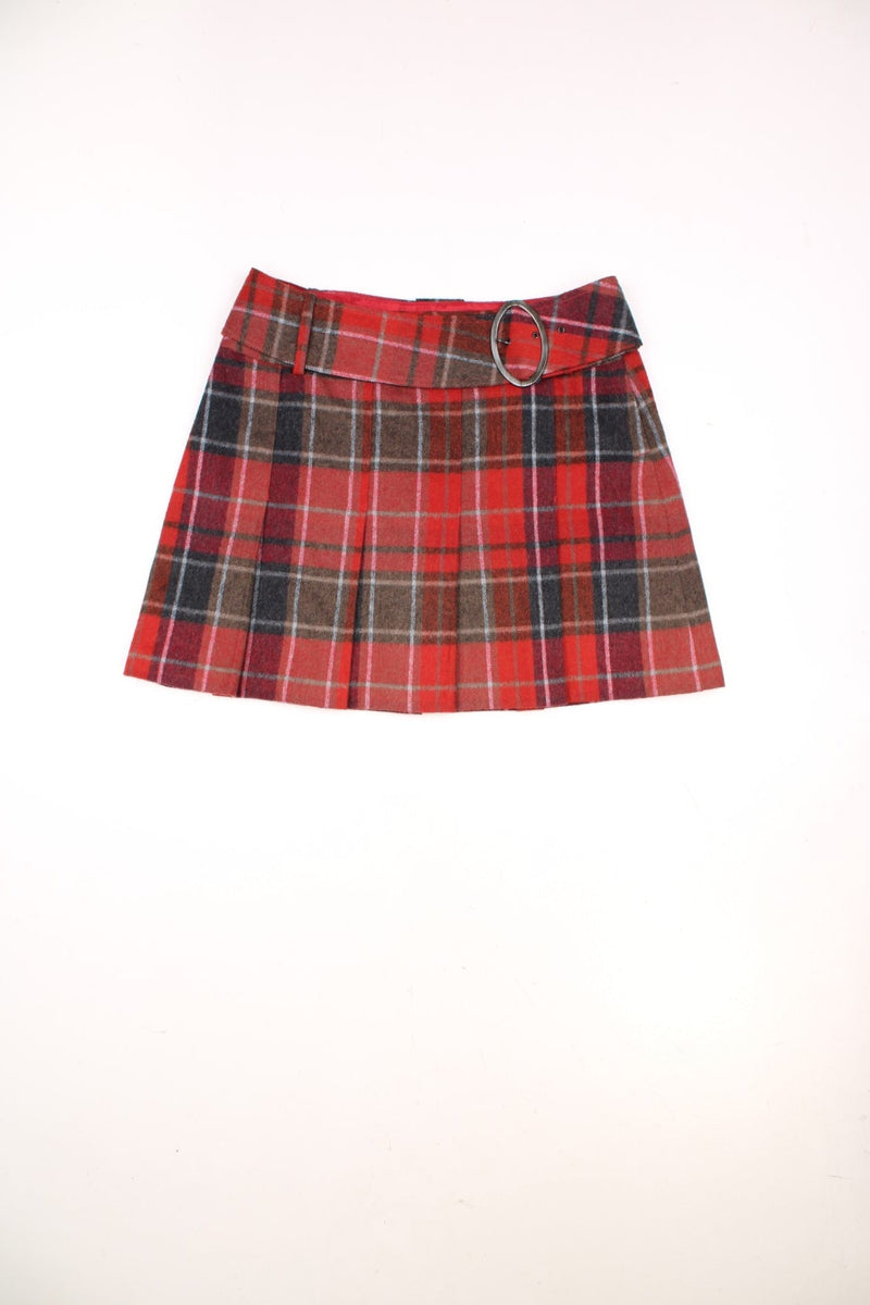 Y2K red and black plaid mini skirt by Next with a concealed side zip, box pleats and a detachable belt with an oval buckle. 