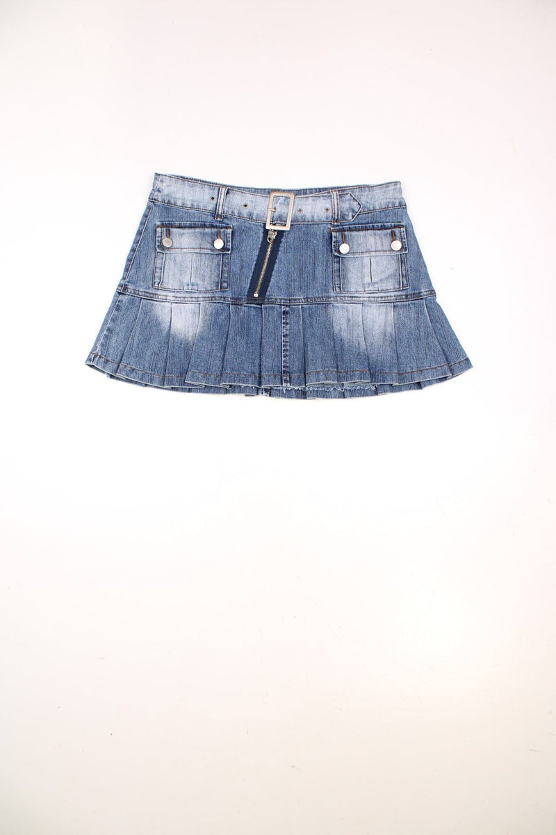 Y2K pleated denim skirt by LET ME TRY with an attached belt, zip closure, and two buttoned front pockets. 