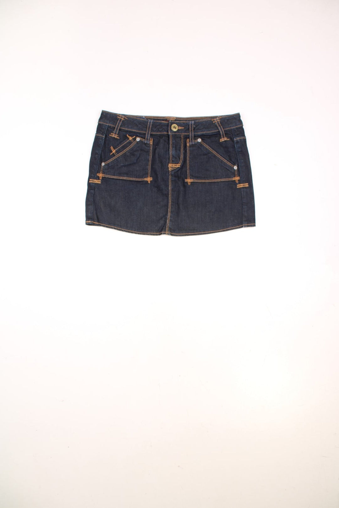 Y2K dark wash denim mini skirt by Guess Premium with zip and button closure, and front and back pockets. 