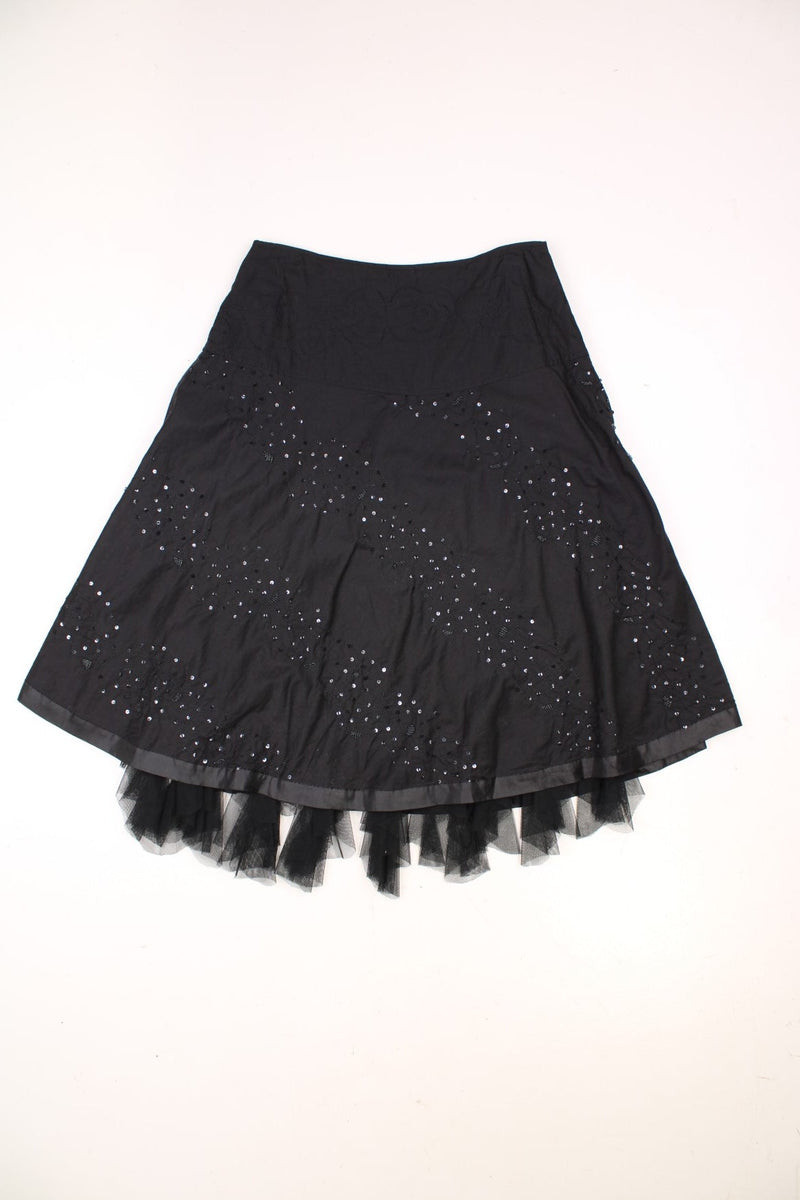 Y2K black skirt with tulle-hemmed underskirt and floral sequined embroidery. 