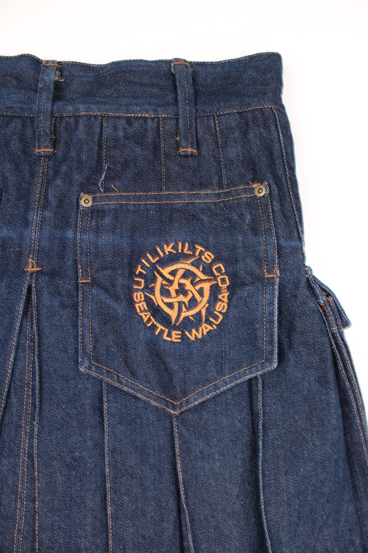 Heavy pleated denim kit by Utilikilts. Features popper buttons to close, belt loops and utility pockets on the sides. good condition Size in Label: 34 - Mens L Our Measurements: Waist: 34 inches Length: 19 inches Please ensure you check all measurements 