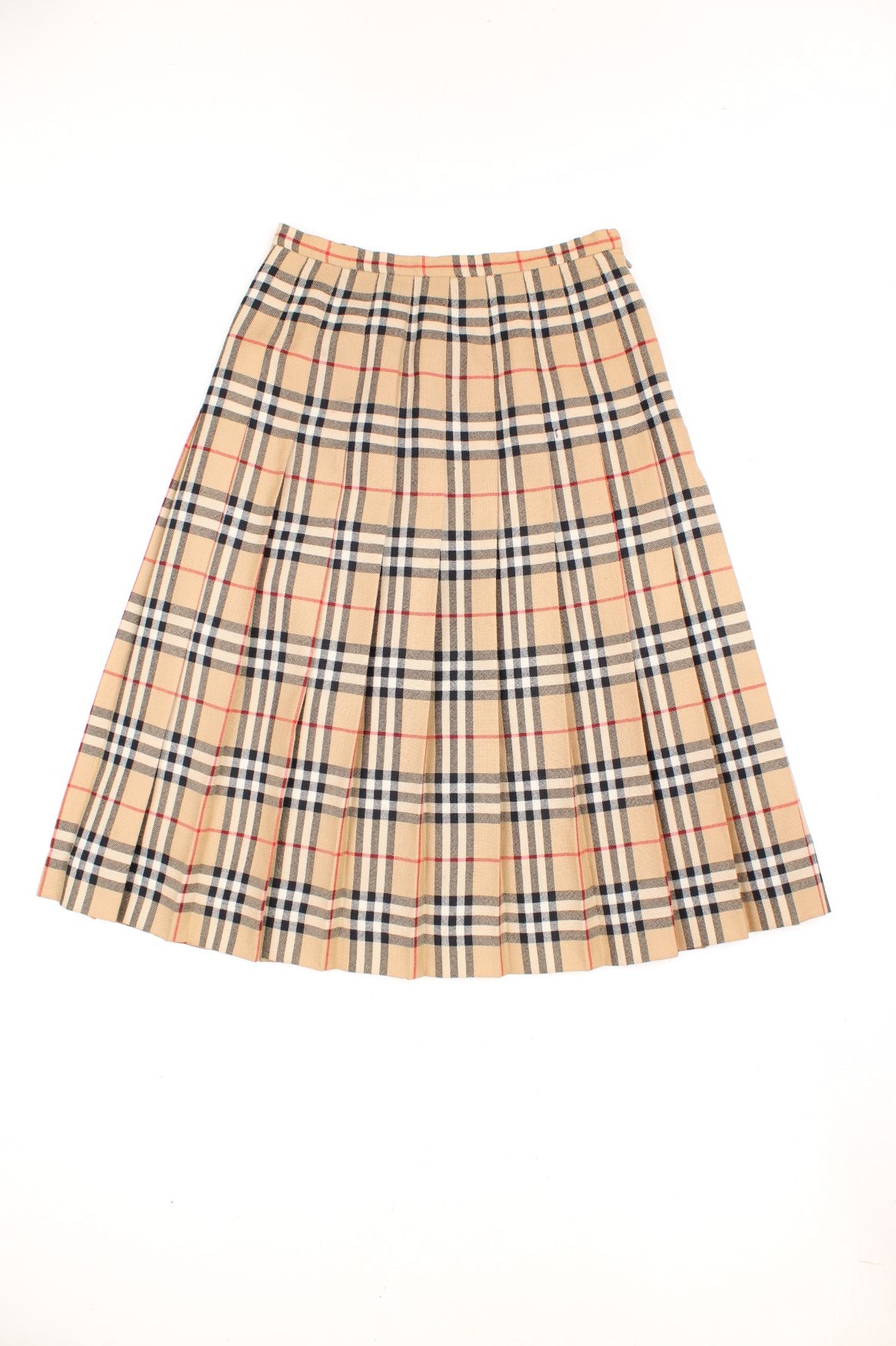 Vintage Burberry (then Burberrys) pleated wool midi skirt in the signature brown, black and red Burberry plaid pattern. Has a metal hook and zip fastening on the side. 