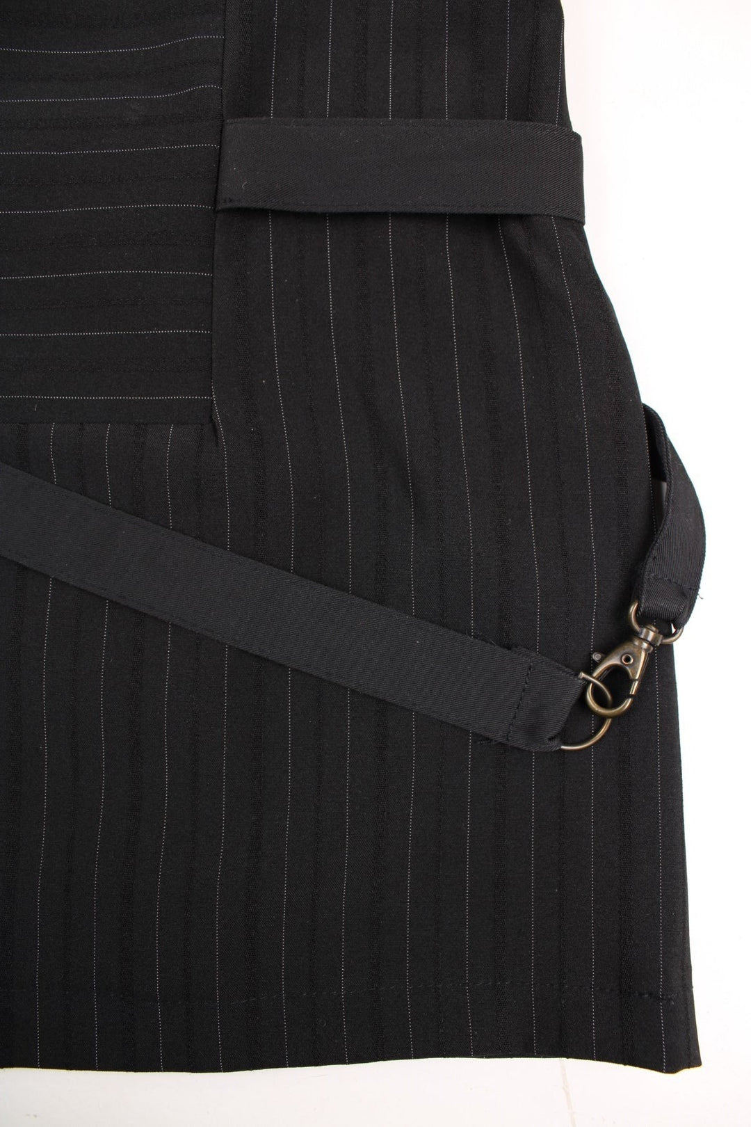 Y2K pleated and pinstripe mini skirt in black with strap detail.