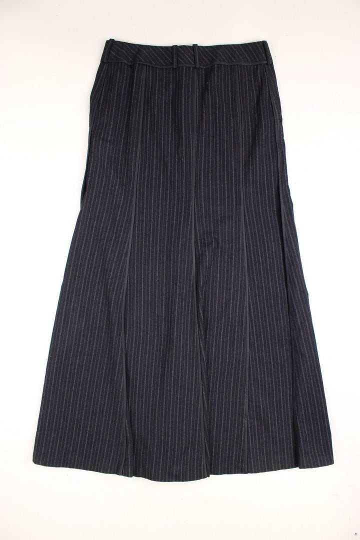 Vintage DKNY maxi skirt in black pinstripe. Featuring pockets and belt detail.