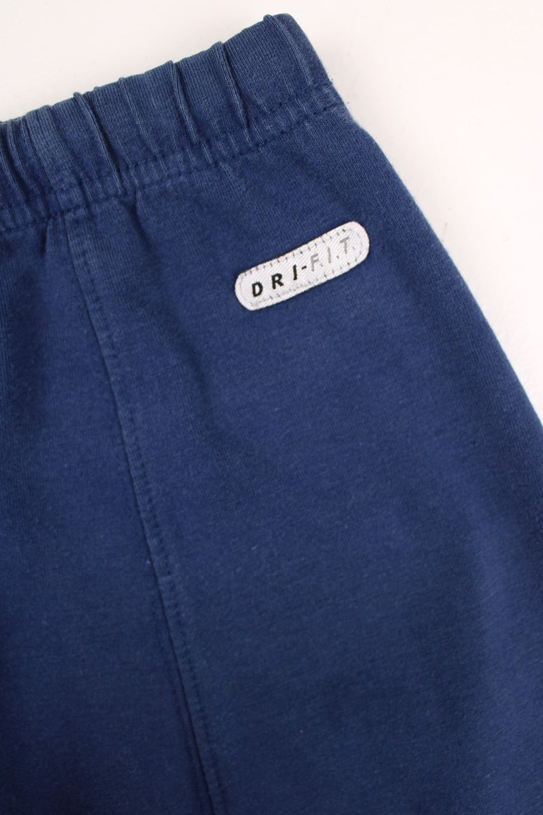 Vintage Nike mini skirt in navy with logo embroidered on the front.