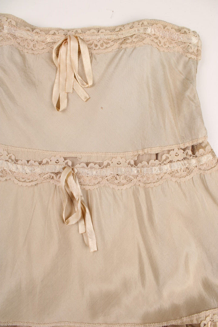 Y2K maxi Skirt  in tan with lace and ribbon detail.